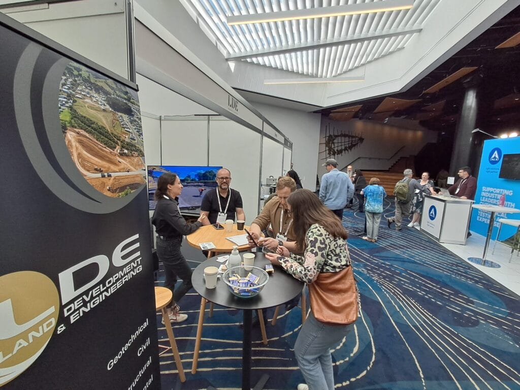 a group of people at exhibition table