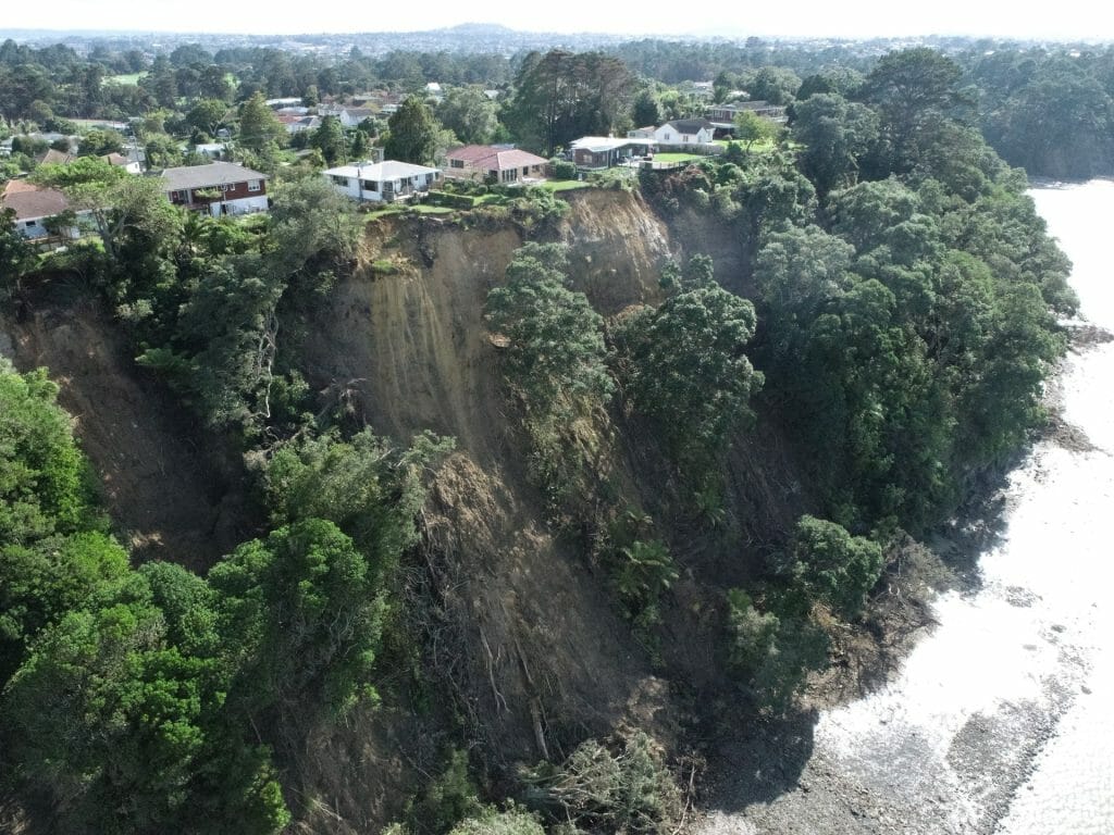 aerial image of houses and landslide