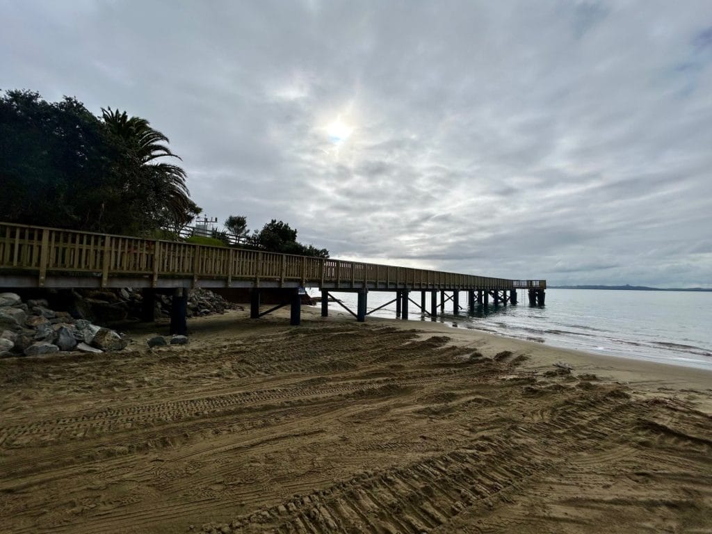 A long timber wharf out over water