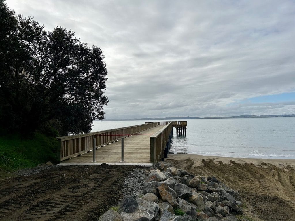 Looking down the length of completed timber wharf