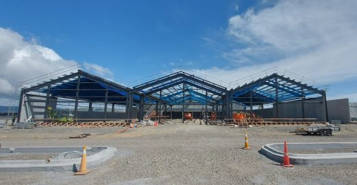 A building under construction with blue sky
